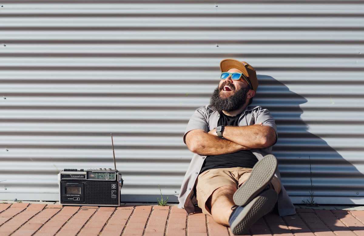 Man enjoying sun with radio